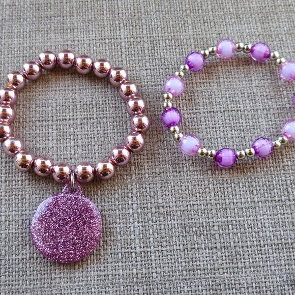 Jewelry - Girl Bracelet Set of 2 Purple and Gold Tone stretched Wrist Band Fashion Jewelry